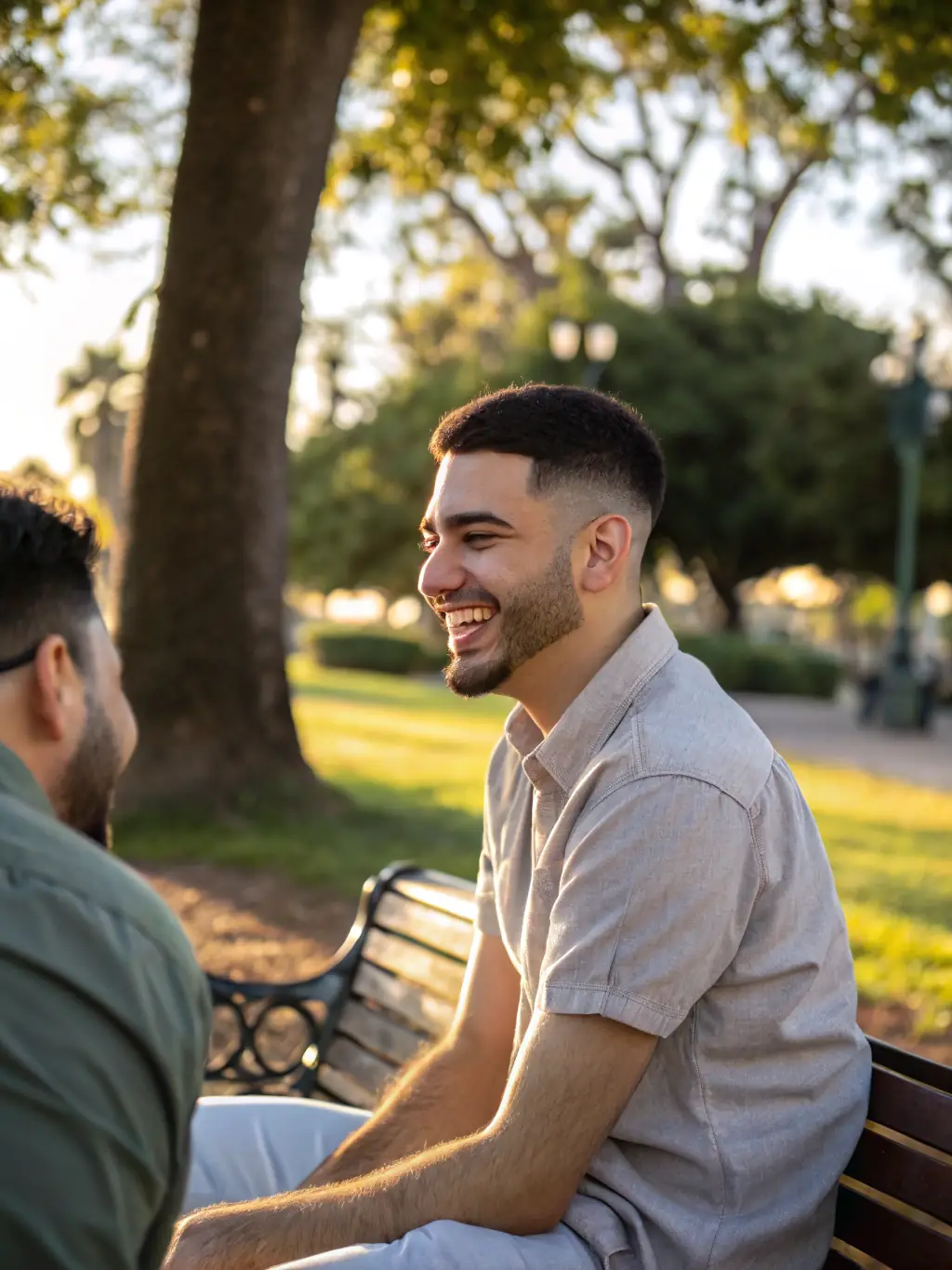 An image of a mentor and mentee having a discussion in a park, symbolizing a relaxed and supportive coaching environment.